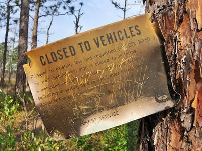 Closed to Vehicles sign in Croatan National Forest
