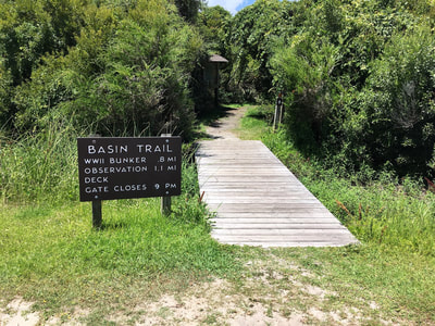 The start of the salt marsh basin trail at Fort Fisher