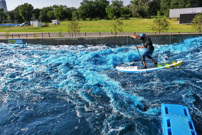 SUP on the whitewater at the Riversport Rapids facility in Oklahoma City