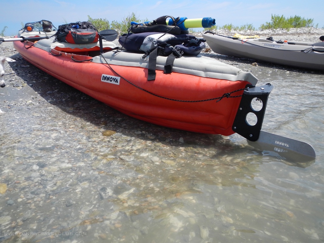An Innova Helios inflatable kayak on the beach at Hammock's Beach State Park