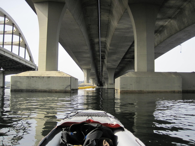 Underneath the I-90 floating bridge while kayaking around Mercer Island, Washington