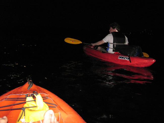 Night kayaking on Lake Washington in Seattle