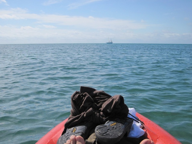 Kayaking toward a double masted sailboat off of Key West