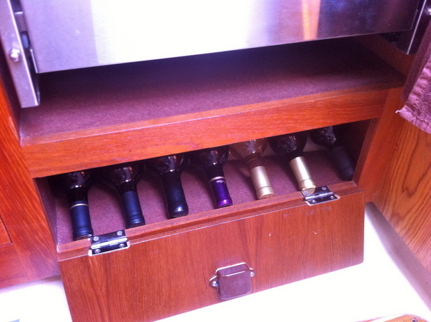 Our wine cabinet under our Force 10 stove aboard our boat Kingsley