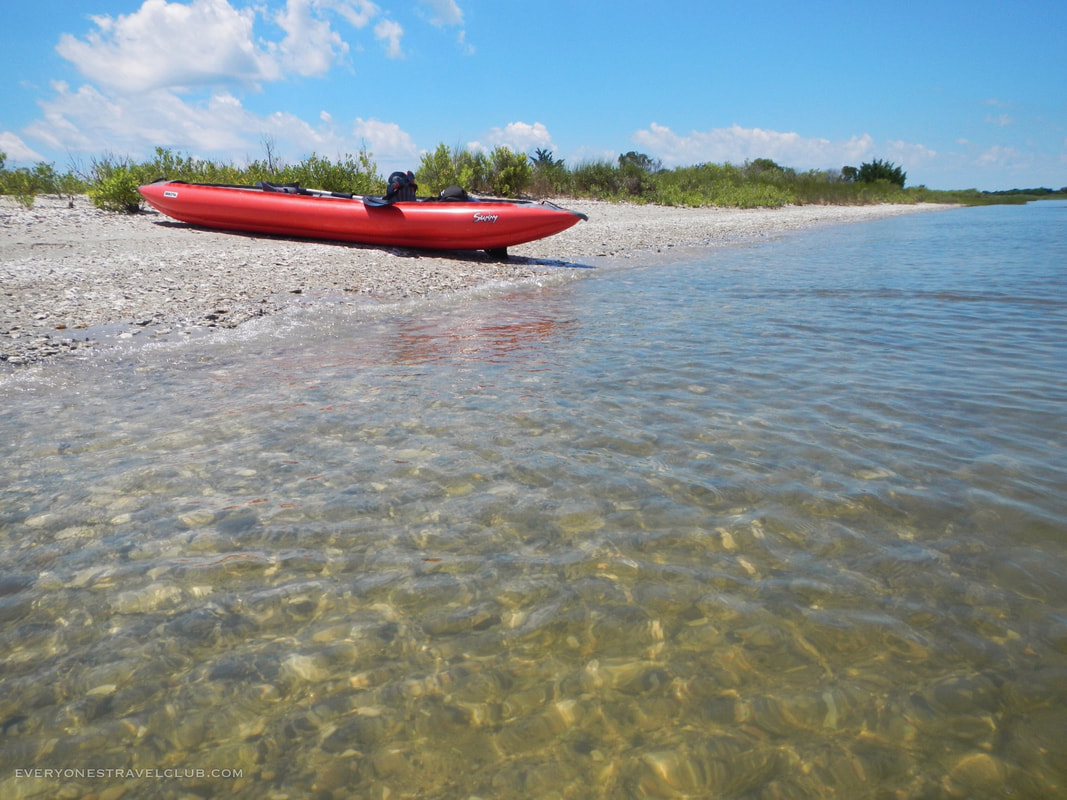 Paddling to Bear Island via our inflatable Innova Sunny kayak.