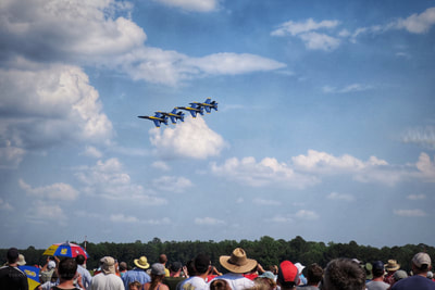 Blue Angels flying by the crowd at the Wings over Wayne 2017 air show