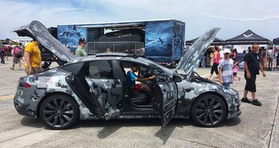 Teslas on display at the 2018 Cherry Point air show