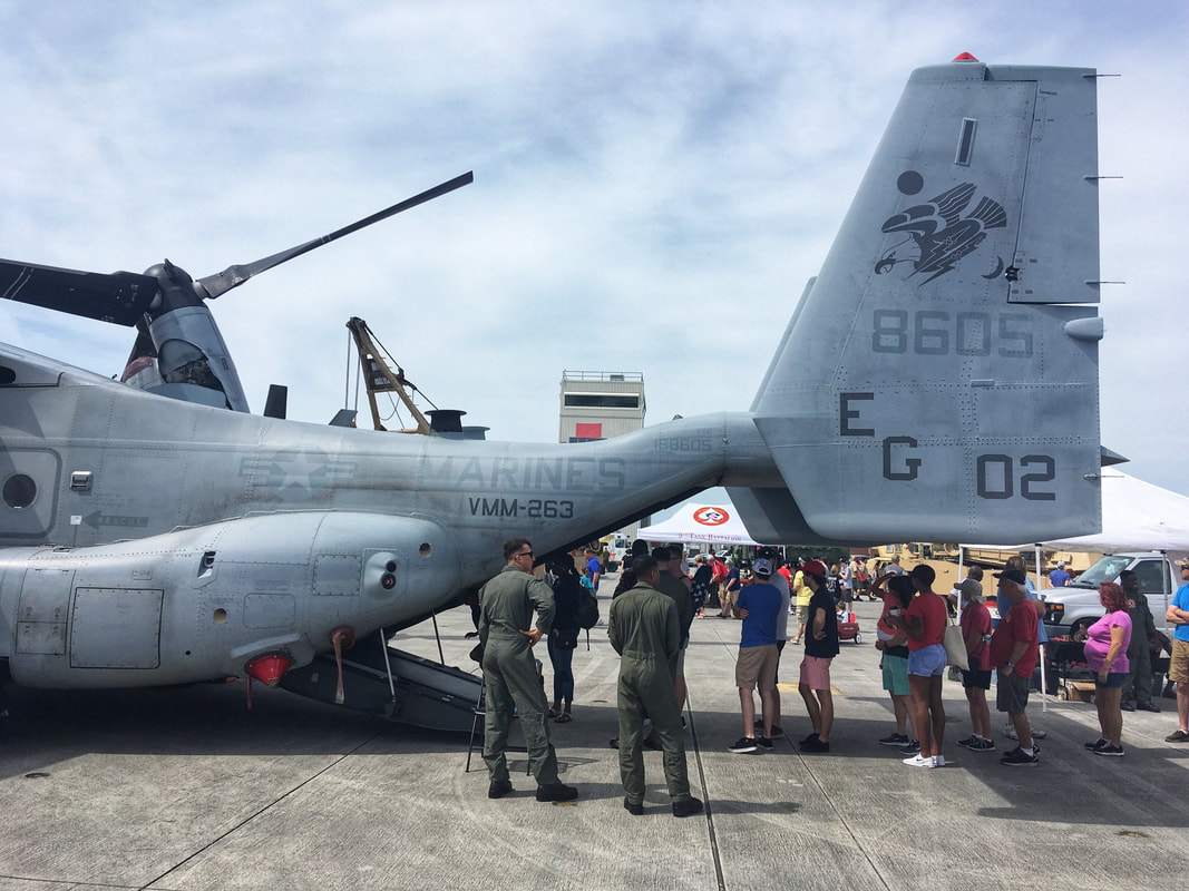 People waiting to board an Osprey at the 2018 Cherry Point air show