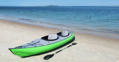 Launching our Innova inflatable kayak from the Point at Emerald Isle, NC.