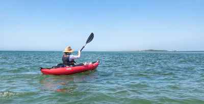 Paddling to Hammock's Beach State Park's Dudley Island.