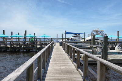 The Swansboro public dock with a dockside bar hosted by the Saltwater Grill