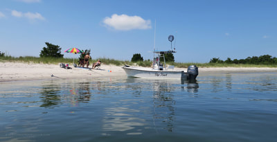 Boat parking on the beach at Sugarloaf Island, NC