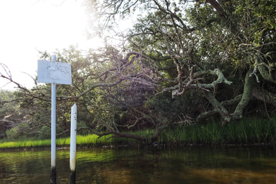 Old Oyster Bed lease signs in the Stump Sound near the Permuda Island Reserve