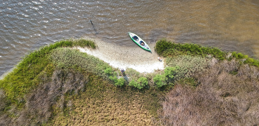A drone picture of our kayak beached on an Eastern North Carolina barrier island